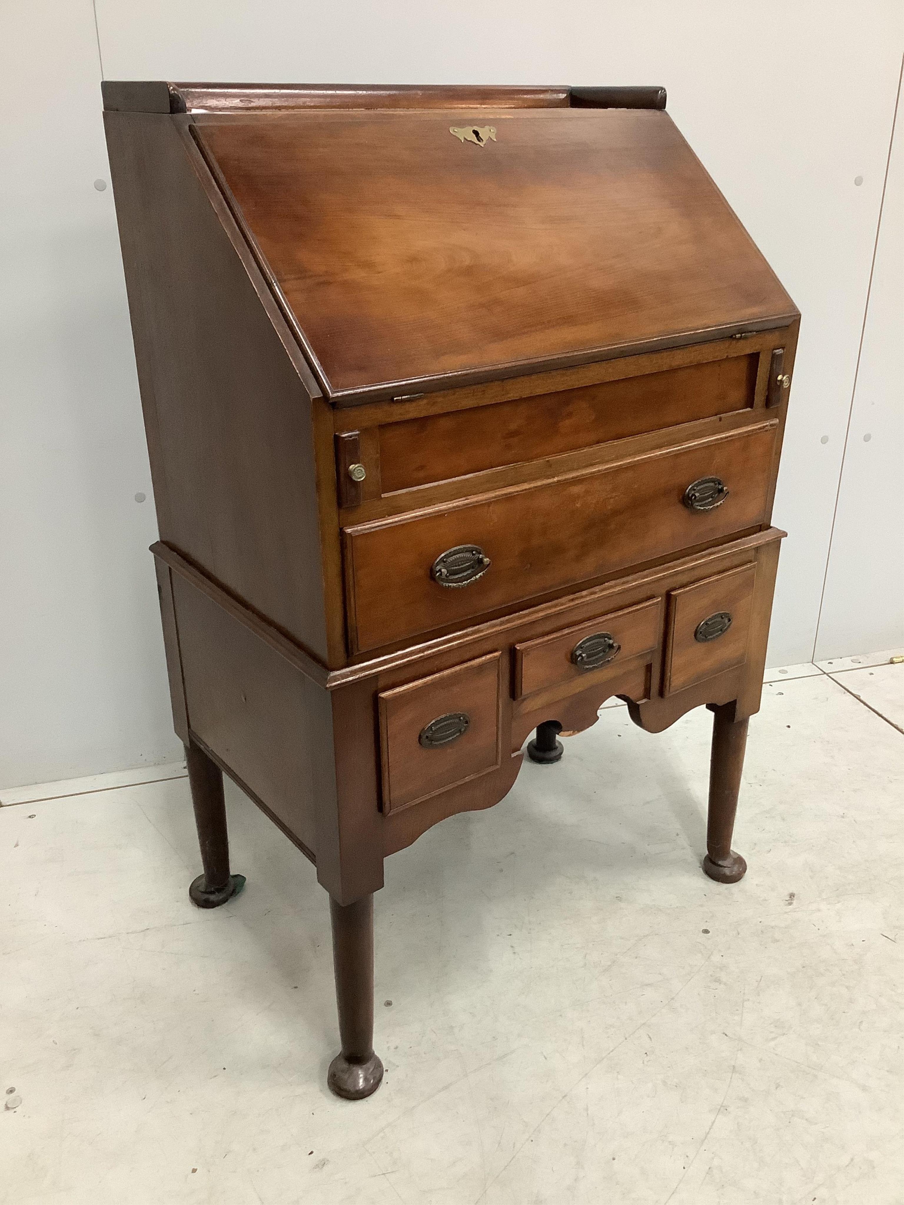 A small early 20th century George III style mahogany bureau, width 63cm, depth 42cm, height 102cm. Condition - fair